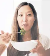  ?? GEOFF MARTIN PHOTOGRAPH­Y ?? Attorney and cookbook author Joanne Lee Molinaro — better known as the Korean Vegan — looks forward to returning to Italy.