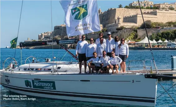  ??  ?? The winning team.
Photo: Rolex/Kurt Arrigo