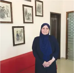  ?? (Eliyahu Kamisher) ?? ISLAMIC JURIST Hana Mansour-Khatib poses Sunday in her office in Tamra, in the eastern Galilee.