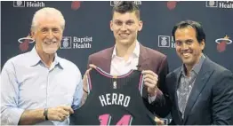  ?? CARLINE JEAN/SOUTH FLORIDA SUN SENTINEL ?? Tyler Herro proved to be a needed fit for the Heat’s Pat Riley, left, and Erik Spoelstra.
