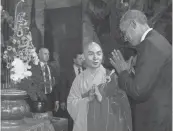  ?? JIM WATSON, AFP/ GETTY IMAGES ?? President Obama pays respects Tuesday during a visit with Abbot of the Jade Emperor Pagoda Thich Minh Thong at the pagoda in Ho Chi Minh City, formerly called Saigon.