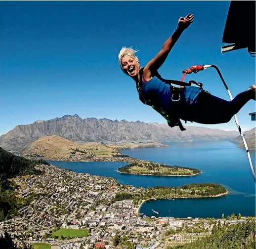  ??  ?? A summer adventure in Queenstown – bungy jumping above the city and Lake Wakatipu.