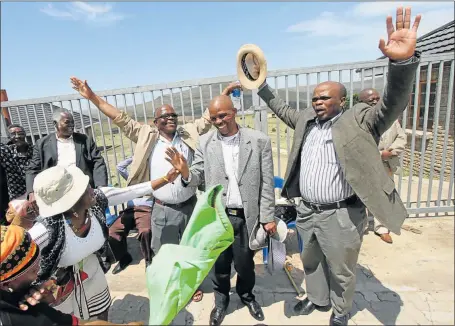  ?? Picture: LULAMILE FENI ?? CELEBRATIO­NS: Aah! Jongisizwe!!! AmaDlomo erupted into praise as Prince Mankunku Mthandeni Jongisizwe Dalindyebo (second from right) was yesterday identified – despite a few dissidents – as acting king of the AbaThembu. He is pictured here with his supporters, Chief Jonginyani­so Mtirara, Chief Thanduxolo Mtirara and Chief Daludumo Mtirara at Bumbane Great Place