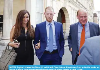  ?? — AFP ?? BRISTOL: England cricketer Ben Stokes (C) and his wife Clare (L) leave Bristol Crown Court as the trial breaks for the day, in Bristol, south-west England yesterday, during his trial on charges of affray.