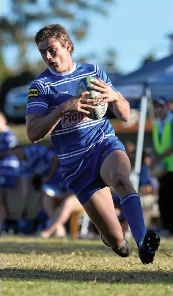  ?? PHOTO: KEVIN FARMER ?? IN FULL FLIGHT: Andre van Staden crosses for a USQ try against Condamine in their round nine Risdon Cup meeting.