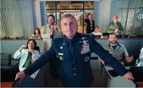  ?? Netflix via AP ?? ■ Steve Carell, center, stars in the comedy series "Space Force," available for streaming on Netflix.