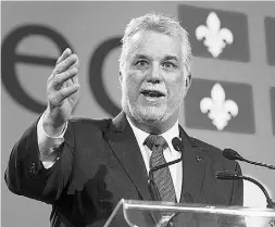  ?? Paul Chiason / THE CANADIAN PRESS ?? Quebec Premier Philippe Couillard accuses PQ Leader
Pierre Karl Péladeau of living in a parallel world.