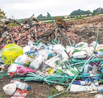  ?? Picture: Steve MacDougall. ?? Mess and rubbish left behind on Jack Martin Way, Dundee. However, prosecutio­n rates for fly-tipping remain low and figures for the problem are hard to find.