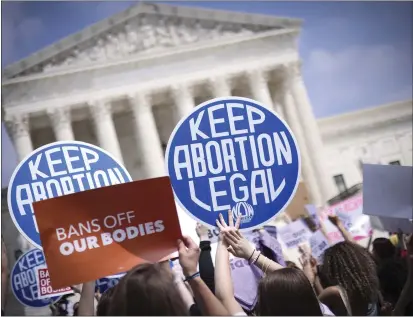  ?? WIN MCNAMEE — GETTY IMAGES/TNS ?? Pro-choice and anti-abortion activists demonstrat­e in front of the Supreme Court Building on Tuesday, May 3, 2022, in Washington, D.C.
