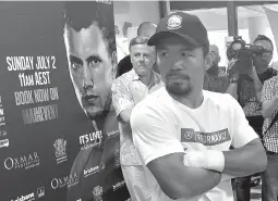  ?? AP Photo/John Pye ?? Manny Pacquiao speaks to the media Tuesday in Brisbane, Australia. Pacquiao is putting his WBO belt on the line Sunday against the 29-year-old Australian fighter Jeff Horn.