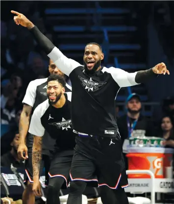  ?? N.C. ASSOCIATED PRESS ?? Team LeBron’s LeBron James, of the Cleveland Cavaliers celebrates a basket against Team Giannis during the second half of an NBA All-Star basketball game in Charlotte,