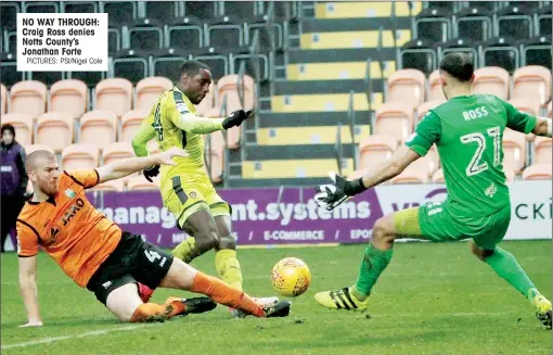  ?? PICTURES: PSI/Nigel Cole ?? NO WAY THROUGH: Craig Ross denies Notts County’s Jonathan Forte