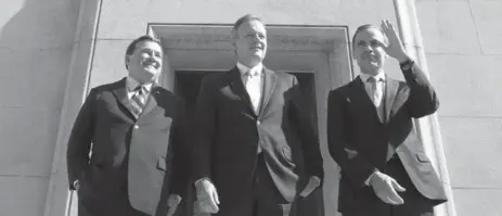  ?? CHRIS WATTIE/REUTERS ?? Finance Minister Jim Flaherty, left, and and outgoing Bank of Canada governor Mark Carney introduce the new governor, Stephen Poloz, on Thursday.