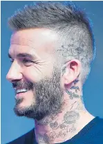  ??  ?? Beckham shows off tattoo on Sunday