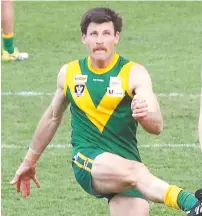  ??  ?? Leongatha’s Chris Dunne steers through one of his four goals against Traralgon in the preliminar­y final. He will be on his third try on Saturday for a Gippsland League premiershi­p team after twice being part of Drouin sides that finished runner-up.