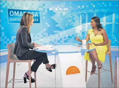  ?? Zach Pagano Associated Press ?? “TODAY” cohost Savannah Guthrie, left, listens to former Trump White House aide Omarosa Manigault Newman on Monday.