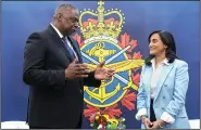  ?? (AP/The Canadian Press/Andrew Vaughan) ?? Canadian Defense Minister Anita Anand (right) and U.S. Secretary of Defense Lloyd Austin hold a bilateral meeting Saturday at the Halifax Internatio­nal Security Forum in Halifax, Nova Scotia.