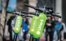  ?? DAVID PAUL MORRIS/BLOOMBERG FILES ?? Lime’s presence in the U.S. and Europe prompted Uber to enter the competitiv­e scooter-rental market.