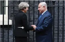  ?? EPA ?? Theresa May greets Benjamin Netanyahu at her Downing Street residence on the centenary of the Balfour Declaratio­n