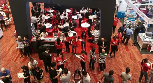  ??  ?? Visitors thronging the booths at a previous Star Education Fair at Setia SPICE Convention Center in Penang.