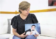  ?? DAVID SANTIAGO dsantiago@miamiheral­d.com ?? Odalys Heredia, mother of Alejandro Suarez, a 20-year-old man with autism who had been missing since Independen­ce Day and was found safely out of state, speaks during an interview at her home in Miami.