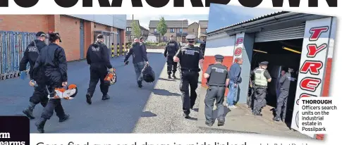  ??  ?? THOROUGH Officers search units on the industrial estate in Possilpark