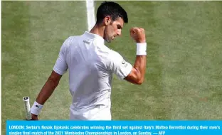  ??  ?? LONDON: Serbia’s Novak Djokovic celebrates winning the third set against Italy’s Matteo Berrettini during their men’s singles final match of the 2021 Wimbledon Championsh­ips in London, on Sunday. — AFP