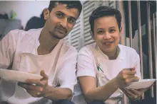  ??  ?? Top, chef Stephane Cadelle with the staff food at Bistro Des Arts. Above, staff enjoy the family meal, left, served at Folly by Nick & Scott