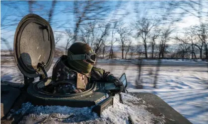  ?? Anadolu/Getty Images ?? A Ukrainian soldier drives an anti-aircraft vehicle towards its position at the frontline in Bakhmut, Donetsk Oblast, Ukraine. Photograph: