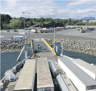  ?? CARLA WILSON ?? Seaspan’s new $44-million loading facility at Duke Point terminal in Nanaimo. More than half the consumer goods delivered to Vancouver Island arrive via a Seaspan ferry, the company says.