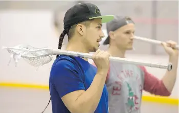  ??  ?? As young boys, their fathers made sticks for them and explained their significan­ce. The game of lacrosse is tied in with the flow of the seasons. The family’s backyard became a testing ground and a place to learn the game.