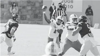  ?? MATT GENRTY/AP ?? Miami quarterbac­k D’Eriq King helped the Hurricanes rally for a dramatic win over Virginia Tech Saturday in Blacksburg, Va.