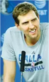  ??  ?? Dirk Nowitzki smiles as he responds to a question during a news conference after their basketball game against the Los Angeles Lakers in Dallas, Tuesday. (AP)