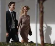  ?? EVAN VUCCI — THE ASSOCIATED PRESS ?? In this Friday, Feb. 10, 2017, file photo, Ivanka Trump, right, walks with her husband, Jared Kushner, senior adviser to the president, to a news conference with President Donald Trump and Japanese Prime Minister Shinzo Abe, at the White House in...