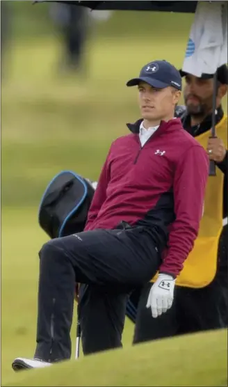  ?? ALASTAIR GRANT — THE ASSOCIATED PRESS ?? Jordan Spieth reacts after a shot on the 11th fairway during the second round of the British Open on Friday.