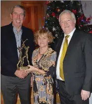  ??  ?? Presentati­on to John O’Callaghan, Castletown­roche, father of Mark O’Callaghan, JB1HC man of the match