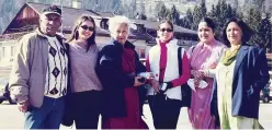  ?? ?? With (from left) Yash Chopra, Preeti, Kim Sharma’s mother, Kim, Shamita Shetty’s mother and Preeti’s mom, in Switzerlan­d before shooting Mohabbatei­n’s Humko Humise Chura Lo