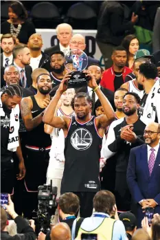  ?? AGENCE FRANCE PRESSE ?? Kevin Durant #35 of Team LeBron is awarded MVP after the 2019 NBA All-Star Game at the Spectrum Center in Charlotte, North Carolina.