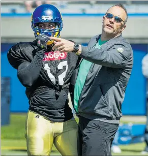  ??  ?? Charles Nwoye with coach Blake Nill. ‘Here’s a guy who was only 18 when he finished his second year of university,’ says Nill. ‘His attitude has been phenomenal. You can’t help but have some patience for him.’