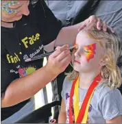  ??  ?? Face painting added a splash of colour.