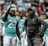  ?? TIM IRELAND / ASSOCIATED PRESS ?? Dolphins running back Jay Ajayi showed his frustratio­n during the team’s 20-0 loss to the Saints in London on Oct. 1. Ajayi rushed for 46 yards on 12 carries and had one reception for 8 yards.