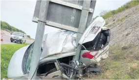  ?? (Photo: Garfield Robinson) ?? A crash scene that tells the graphic story of road deaths