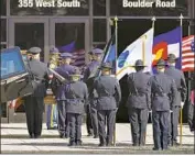  ?? David Zalubowski Associated Press ?? AN HONOR guard carries the casket of Boulder Officer Eric Talley to a church in Lafayette, Colo.