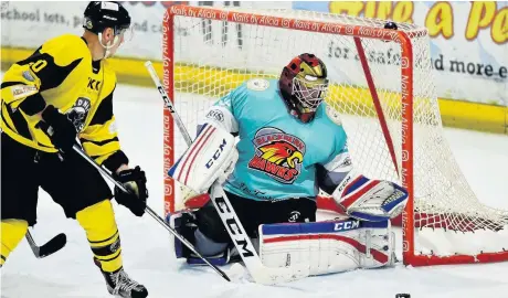  ?? Gw-images.com ?? Widnes player Danny Bullock sees an effort saved by the Blackburn goaltender.