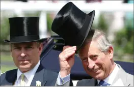  ?? ALASTAIR GRANT — THE ASSOCIATED PRESS FILE ?? Britain’s Prince Charles, right with is brother the Prince Andrew the Duke of York as they arrive in the paddock for the Royal Ascot horse race meeting, Ascot, England.