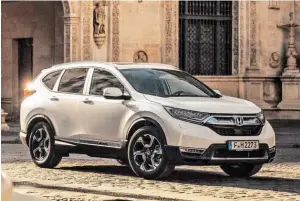  ?? BILD: SN/HONDA ?? Mit eigenständ­iger Antriebste­chnik ohne Getriebe kommt Hondas CR-V Hybrid.