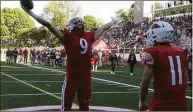  ?? Pete Paguaga / Hearst Connecticu­t Media ?? Greenwich’s Dom DeLuca celebrates a touchdown by kissing his fingers and throws it to the heavens in honor of his late father Larry DeLuca, during a football game between Southingto­n and Greenwich at Cardinal Stadium on Sept. 24.