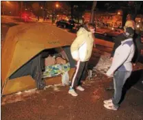  ??  ?? Local residents set up camp to raise awareness about homelessne­ss during a sleepout in February 2012in Oneida, N.Y.