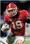  ?? JASON GETZ/JASON.GETZ@AJC.COM ?? Tight end Brock Bowers remains the leader in Georgia’s exceptiona­lly talented array of receivers, pass catchers and downfield blockers.