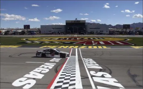  ?? ISAAC BREKKEN — THE ASSOCIATED PRESS ?? Kevin Harvick passes the start/finish line during the Monster Energy Cup race on March 4 in Las Vegas.